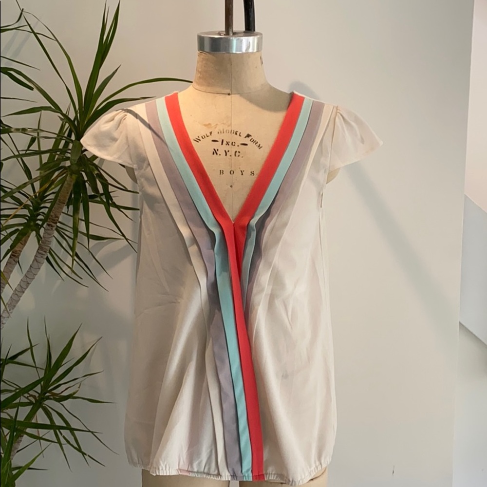 Pastel colored Lumiere cream blouse